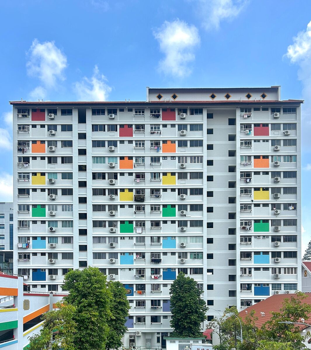A Housing and Development Board apartment block in Bishan, its facade broken into small brightly coloured panels